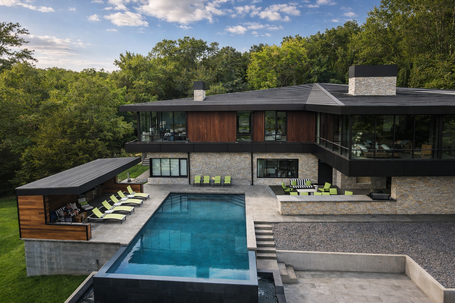 Shaw Hollow three-sided infinity edge pool with EcoFinish mirror finish, stone and woodwork integration, Springfield MO