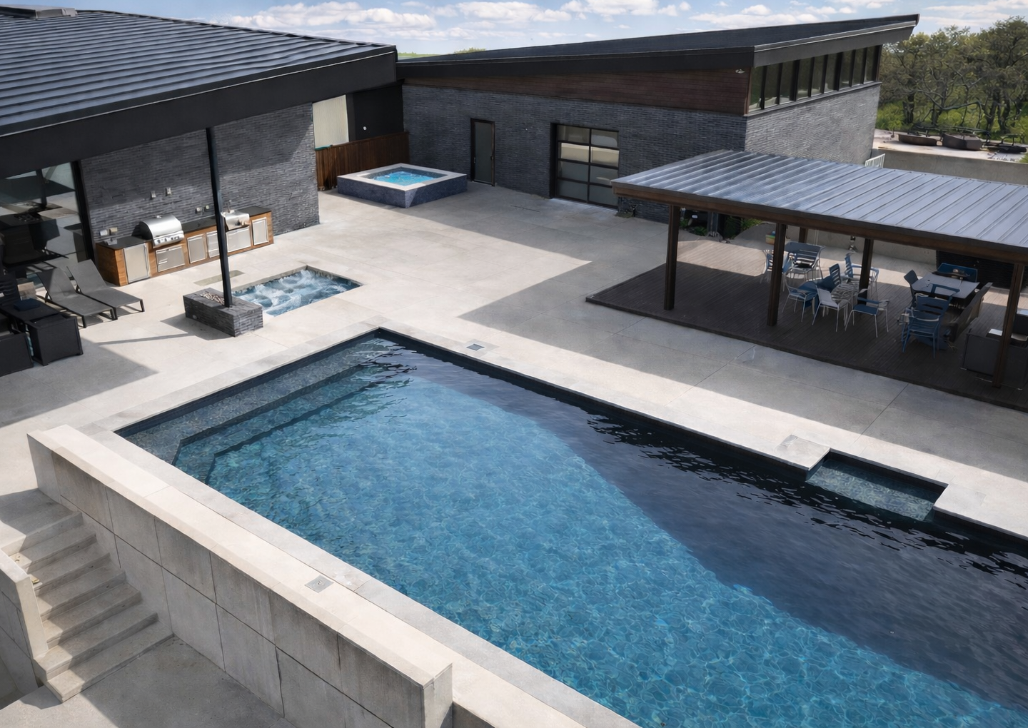 Aerial view of the Belk pool - a professional ICF pool with patio, spa, and pavilions built with the Standard Kit